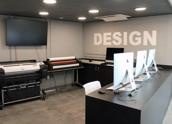design lab with iMacs, large printers, scanners