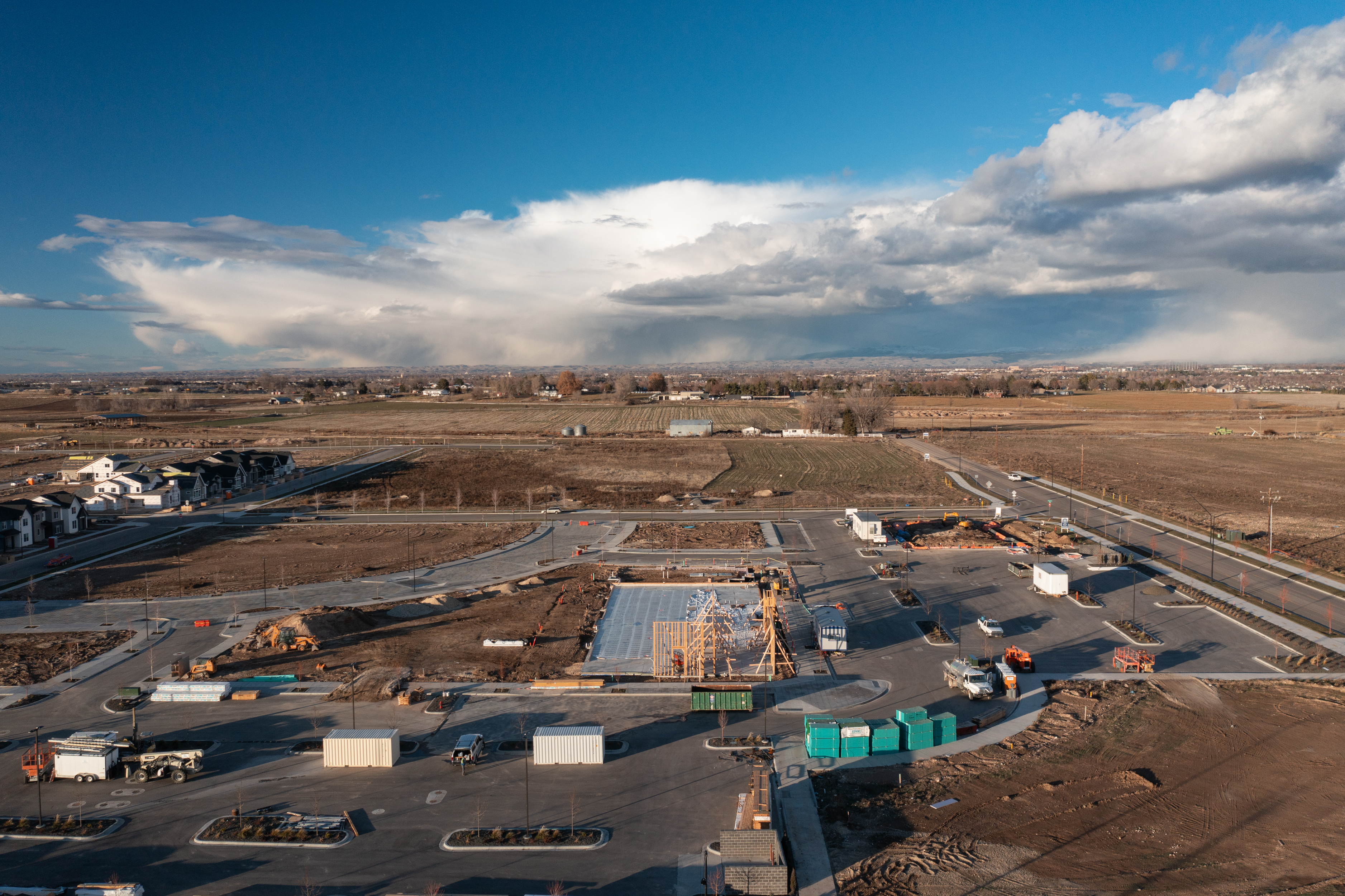 Pinnacle construction site with concrete set and framing starting to go up.