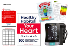 charts, book, and blood pressure monitor