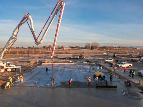 Construction crew of MLD's Pinnacle Branch laying concrete