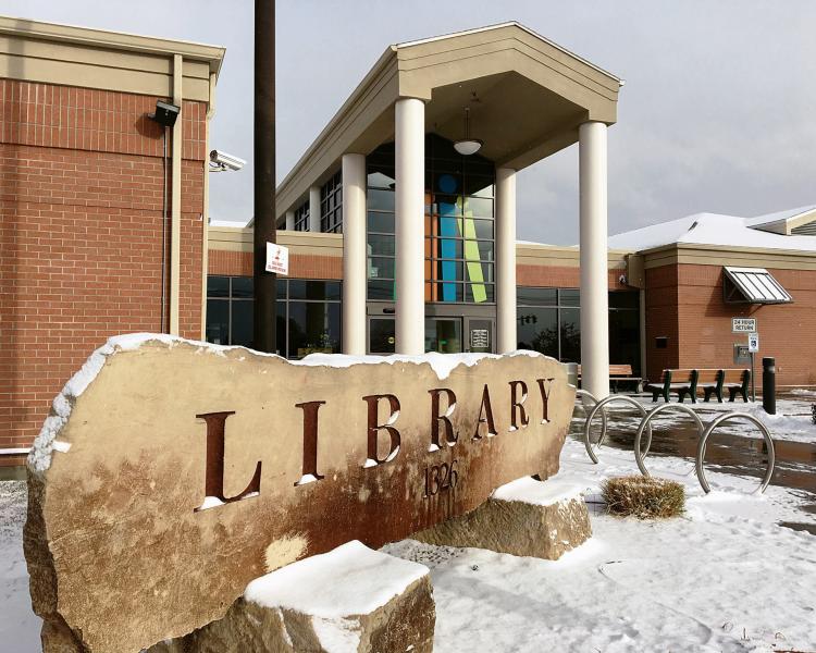 Cherry Lane Library sign and entryway in winter